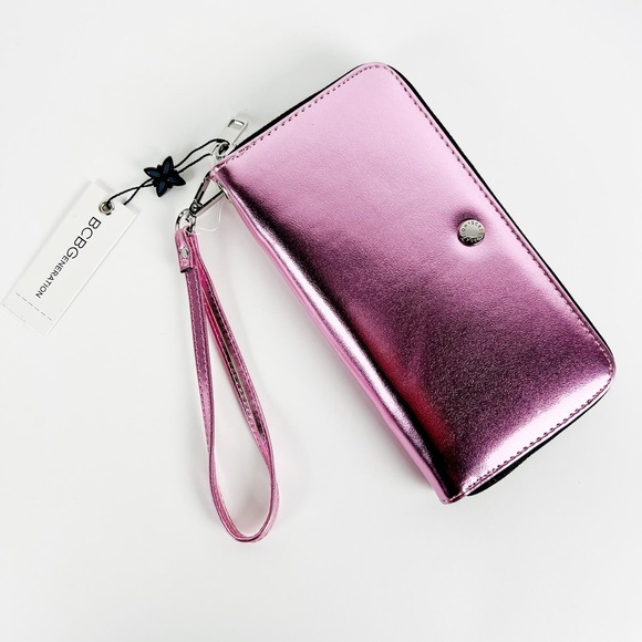 BCBGeneration Handbags - NWT BCBGeneration Kalina Metallic Pink wristlet wallet